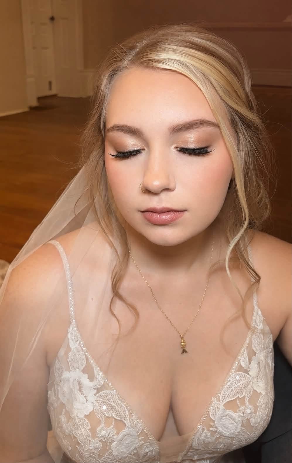 Bridal makeup with champagne shimmer and soft lashes